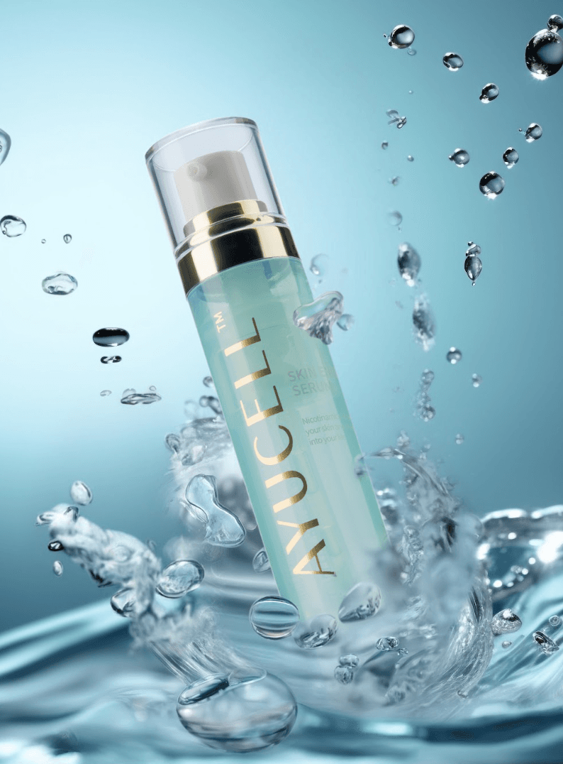 AYUCELL Advanced Skin Serum bottle with water splashing around it.
