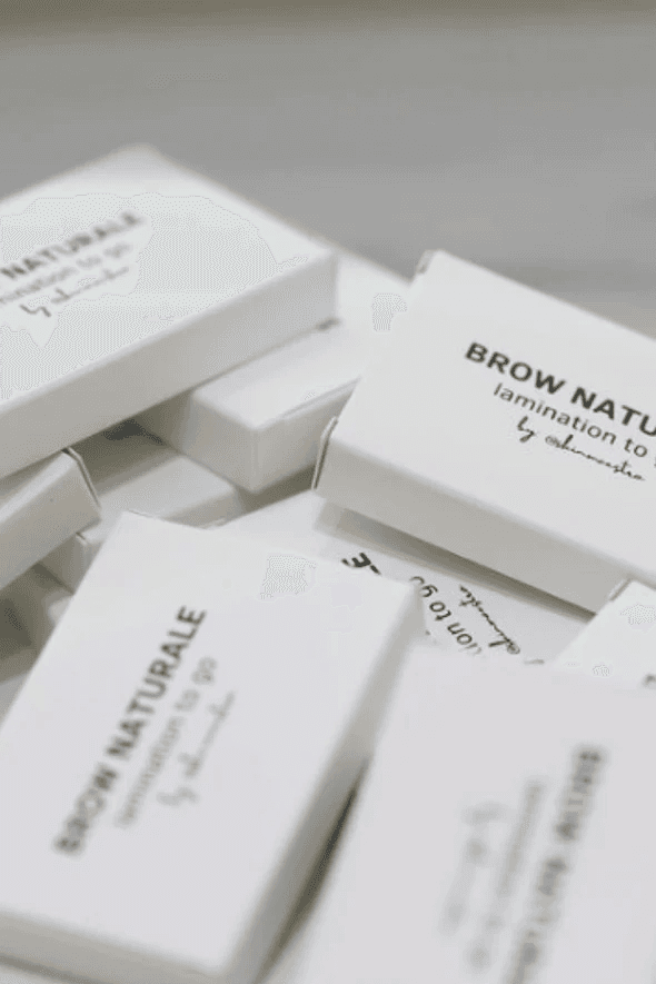 Brow Down Studio Brow Naturale product boxes.